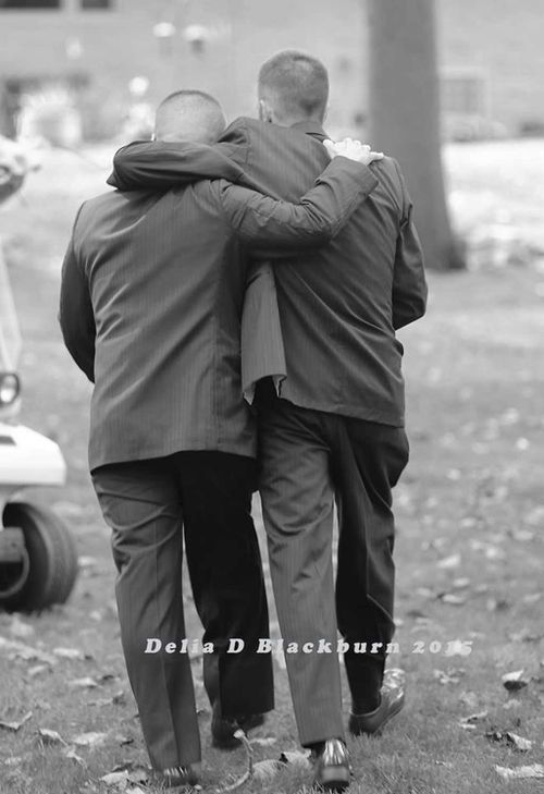 The fathers united the two families on the wedding day. (Delia D Blackburn Photography)