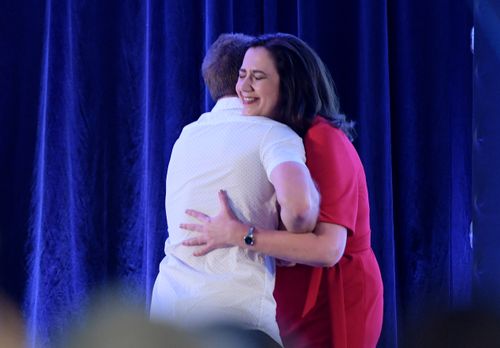 Jeff Horn hugs Ms Palaszczuk after introducing her at the campaign launch today. (AAP)