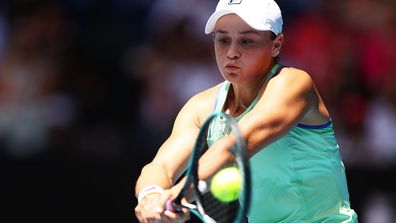 Ashleigh Barty of Australia plays a backhand during her Women's Singles Quarterfinal match