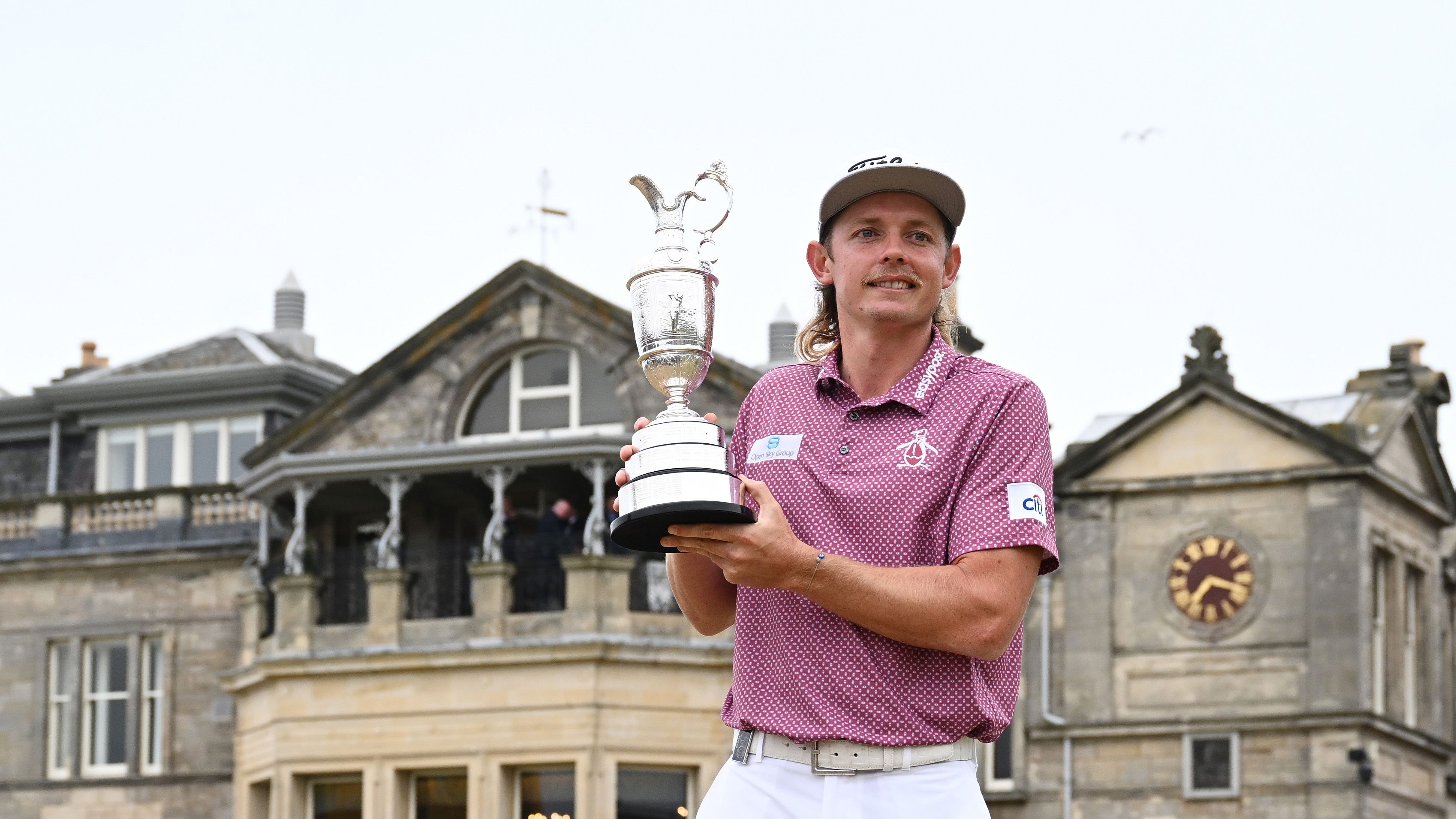 Cameron Smith with the Claret Jug in front of the Royal &amp; Ancient Clubhouse at St Andrews.
