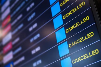 Airport lock down, Flights cancelled on information time table board in airport while coronavirus outbreak pandemic issued around the world