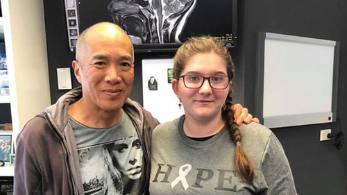 Amelia (right) with renown brain surgeon Charlie Teo. (Supplied)