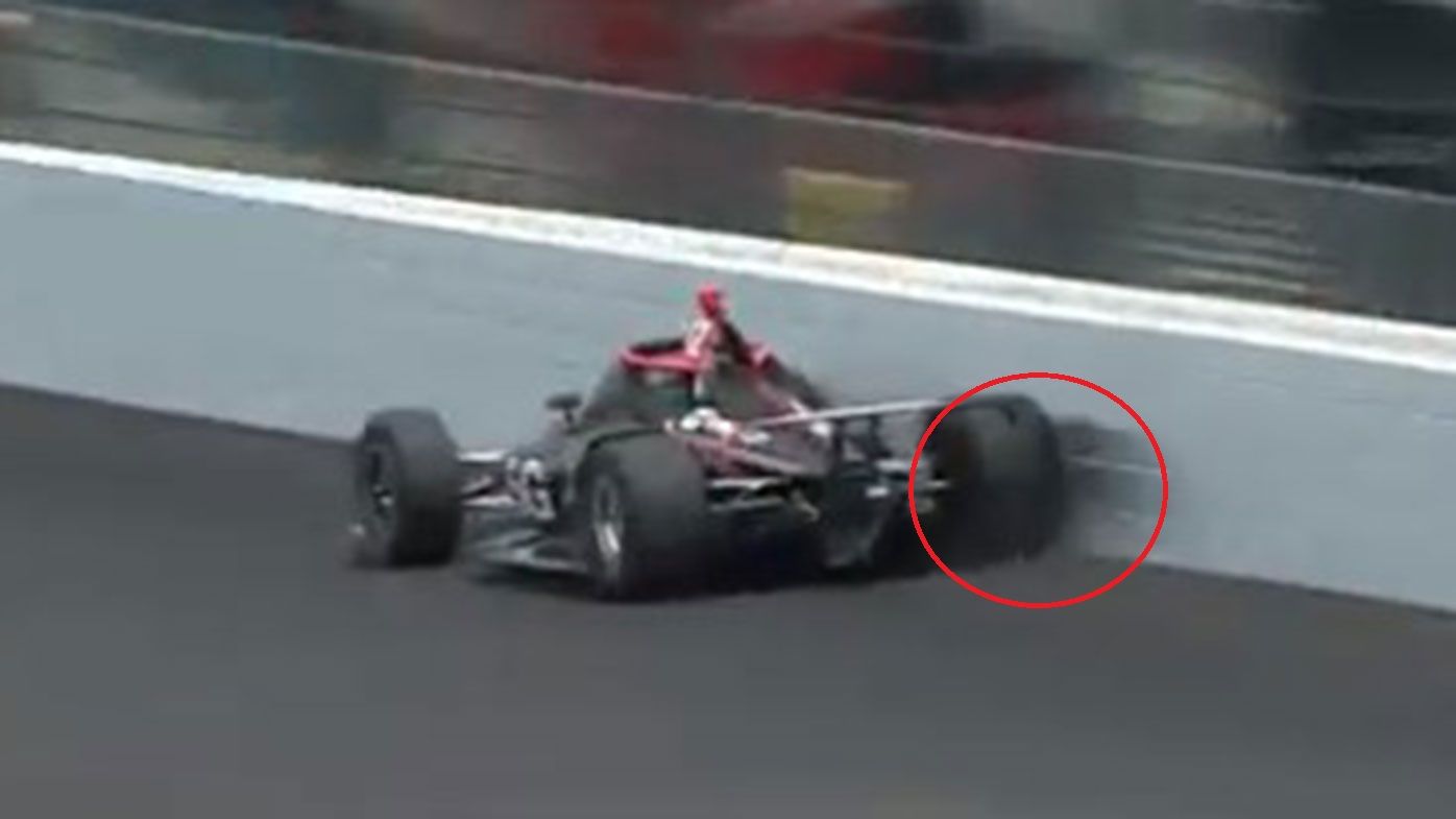 Will Power grazes the wall at 360km/h during qualifying for the Indy 500.