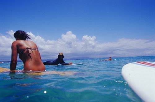 Surfers in the water at Byron Bay on the NSW North Coast.