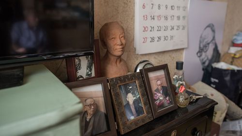 Photographs of former North Korean spy Seo Ok-Ryol are displayed in his home in Gwangju. (AFP)