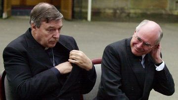 Cardinal George Pell and John Howard in 2004.