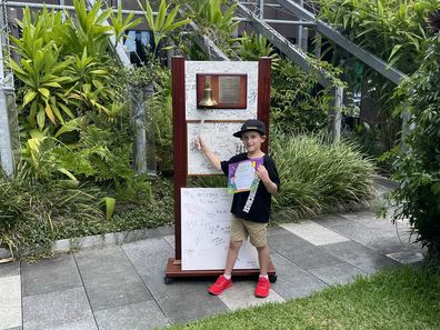 Chase rings the hospital bell signalling the end of his cancer treatment.