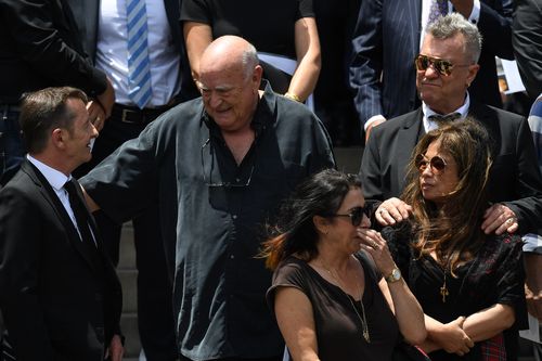 Jimmy Barnes, promoter Michael Chugg outside after the service. Picture: AAP