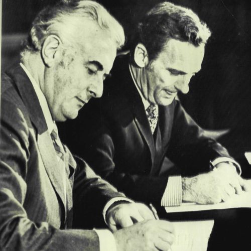 Gough Whitlam and Treasurer Bill Hayden sign Medibank agreement for W.A. and Vic. July 30, 1975.