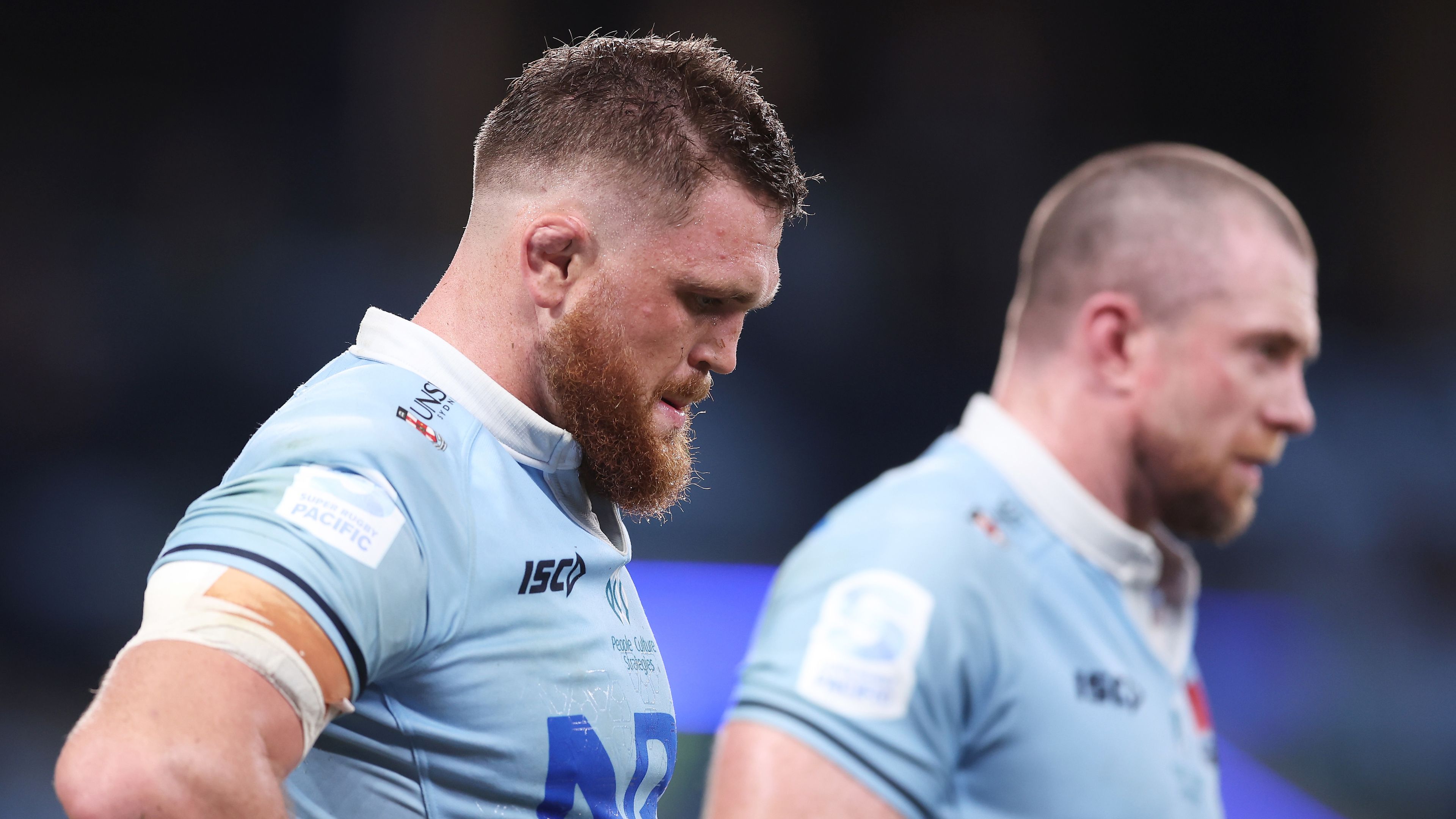 Lachlan Swinton of the Waratahs looks dejected after the final Rebels try during the round six Super Rugby Pacific match between NSW Waratahs and Melbourne Rebels.