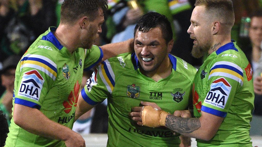Raiders' winger Jordan Rapana is congratulated by team mates after scoring a try against the Panthers.(Getty)