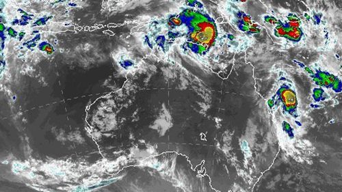 An image shows the storms moving towards the NT and Queensland mainland.