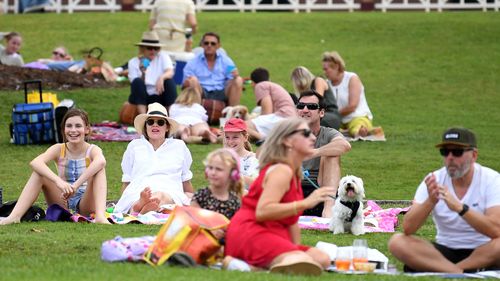 People enjoy a Mother's Day picnic in Brisbane, Sunday, May 10, 2020. 