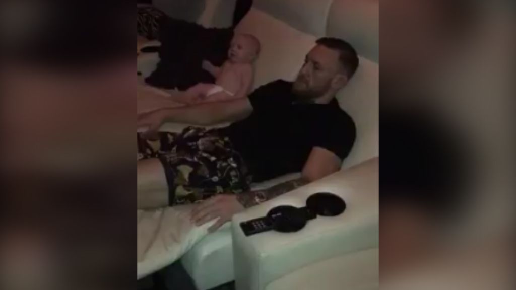 McGregor watches the fights with his son