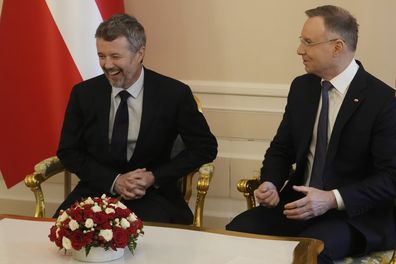 Denmark's King Frederik X, left, and Polish President Andrzej Duda, right, speak during a meeting in Warsaw, Poland, Wednesday, Jan. 31, 2024. 