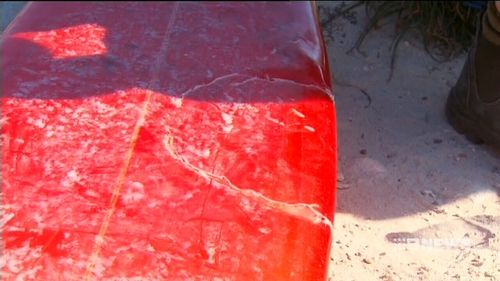 Mr Longrass's damaged surfboard. (9NEWS)