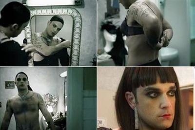 Never one to be accused of shyness, Robbie let his inner diva shine through in the music video for 'She's Madonna'.