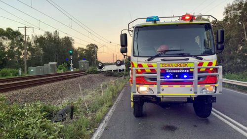 Crews from the Dora creek Rural Fire Brigade attended the scene to assist in removing the vehicle.