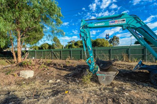 A digger is seen at the site of a factory in Plympton, Adelaide, Friday, February 2, 2018. (AAP)