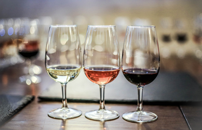 Wine tasting: glasses of white, rose and red wine