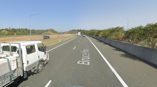 Queensland police seeking witnesses after man's body found 100 metres from his bike on Bruce Highway