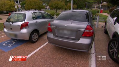 NSW woman was fined $608 for having two wheels inside disabled parking spot while trying to park her car, calling the penalty 'unfair'