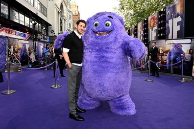 LONDON, ENGLAND - MAY 07: John Krasinski poses with Blue during the UK Premiere of "IF" at Cineworld Leicester Square on May 07, 2024, in London, England. (Photo by Kate Green/Getty Images for Paramount Pictures)