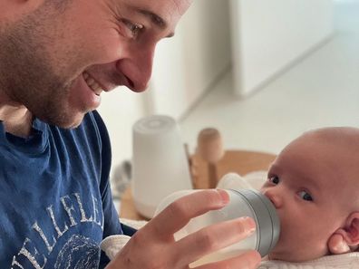 Taylor Goldsmith with son Gus. 