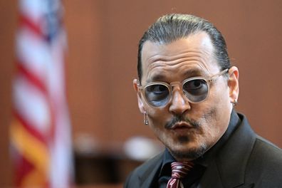 Actor Johnny Depp arrives in the courtroom at the Fairfax County Circuit Court in Fairfax, Va., Tuesday May 3, 2022. 