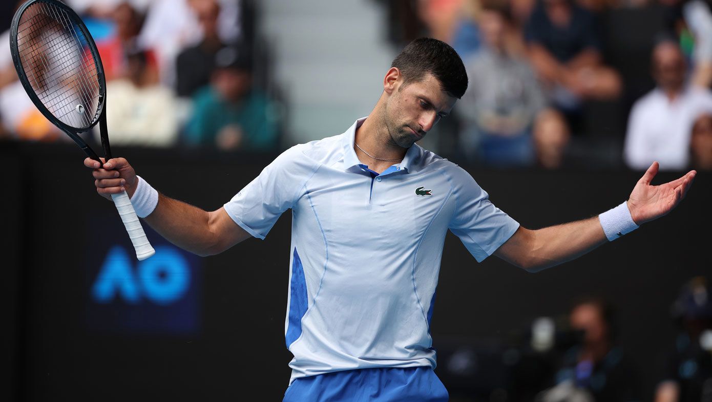 Novak Djokovic reacts after dropping a game against Jannik Sinner.
