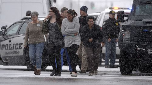 People are rescued near the scene of a shooting in Colorado Springs. (Getty Images)