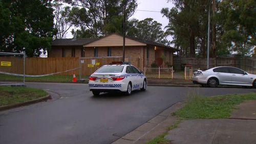 A crime scene was set up as police canvassed the street. (9NEWS)