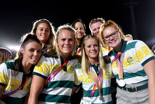 Australian athletes were cheered when they entered Carrara Stadium for the closing ceremony. Sadly no one got to see it on TV. (AAP)