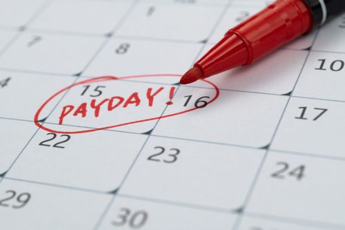 Calendar with red marked payday
