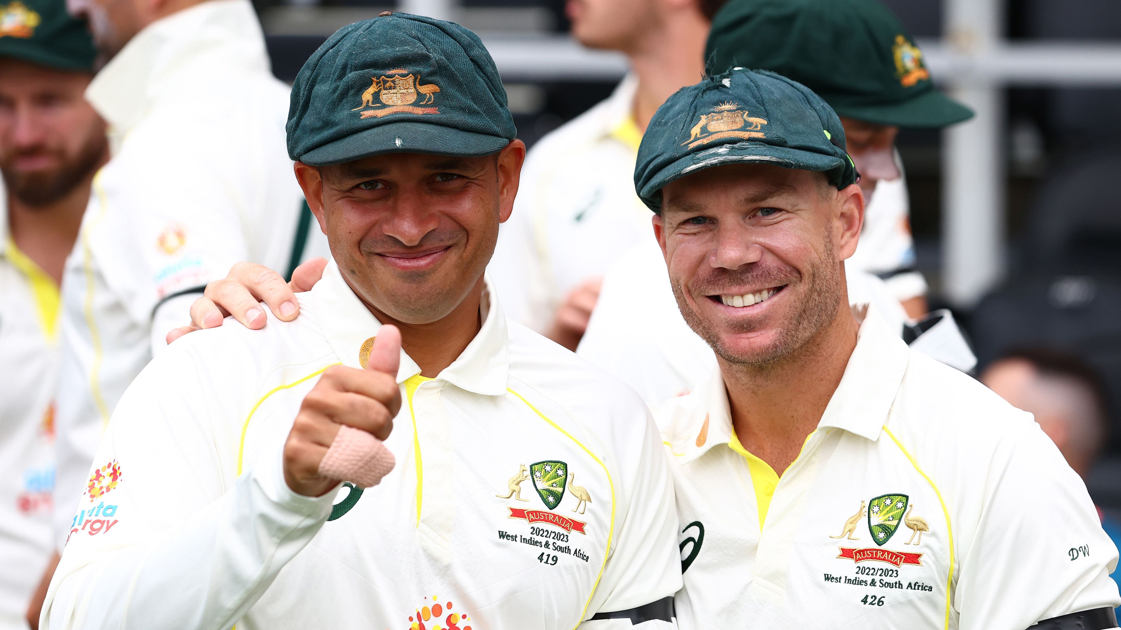 David Warner and Usman Khawaja of Australia talk ahead of day one of the First Test match between Australia and South Africa at The Gabba on December 17, 2022 in Brisbane, Australia. (Photo by Chris Hyde - CA/Cricket Australia via Getty Images)
