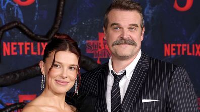 HOLLYWOOD, CALIFORNIA - NOVEMBER 06: (L-R) Millie Bobby Brown and David Harbour attend the Los Angeles Premiere of Netflix's "Stranger Things" Season 5 at TCL Chinese 6 Theatres on November 06, 2025 in Hollywood, California. (Photo by Kevin Winter/Getty Images)