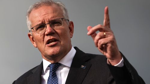 Former prime minister Scott Morrison speaks to media.