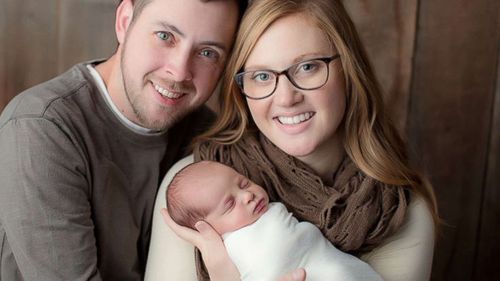 Parents Tina and Benjamin Gibson. (Southern Charm Portraits) 