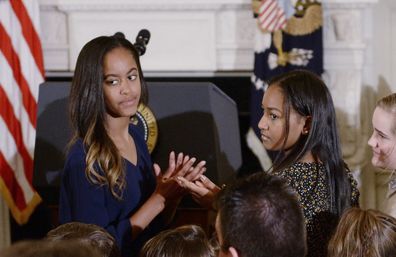 Malia Obama (L) and Sasha Obama