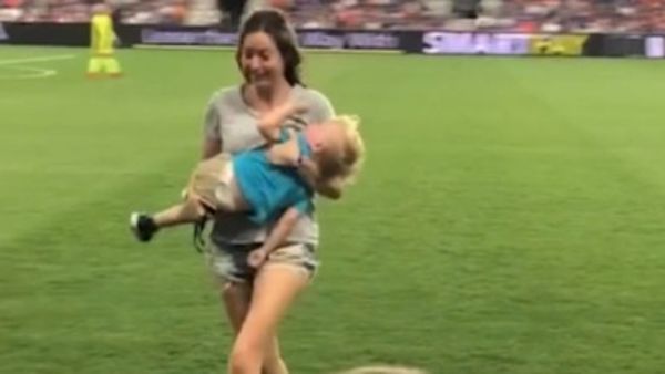 Mom rescues 2-yr-old who ran onto field at pro soccer game - Upworthy