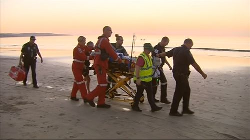 An off-duty paramedic tended to the woman after she was pulled from the water.