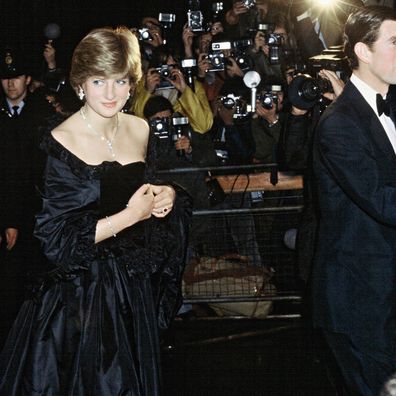 Lady Diana Spencer arrives in a revealing David Emanuel black dress for her first official engagement with Prince Charles at a fundraising concert at Goldsmith's Hall, London in March 1981 a few months before her marriage.  London, GREAT BRITAIN - 03/1981