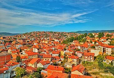 Which municipality is the largest city and official capital of Kosovo?