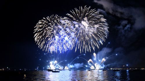 Glittering fireworks over Darwin Harbour for Territory Day. (AAP)
