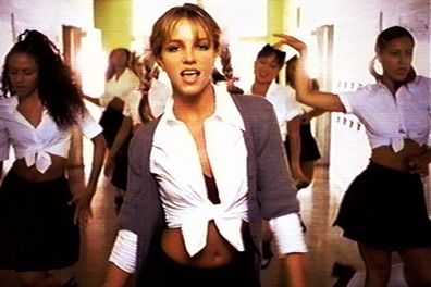 Who could ever forget her first single, 'Hit me baby one more time'? Britney's sexy Catholic schoolgirl get-up caused a massive hoo-ha, and no one could believe the costume was her own (naughty) idea! Check out the clip <a href="http://video.au.msn.com/watch/video/hit-me-baby/xmmejc3" target="new">HERE</a>!
