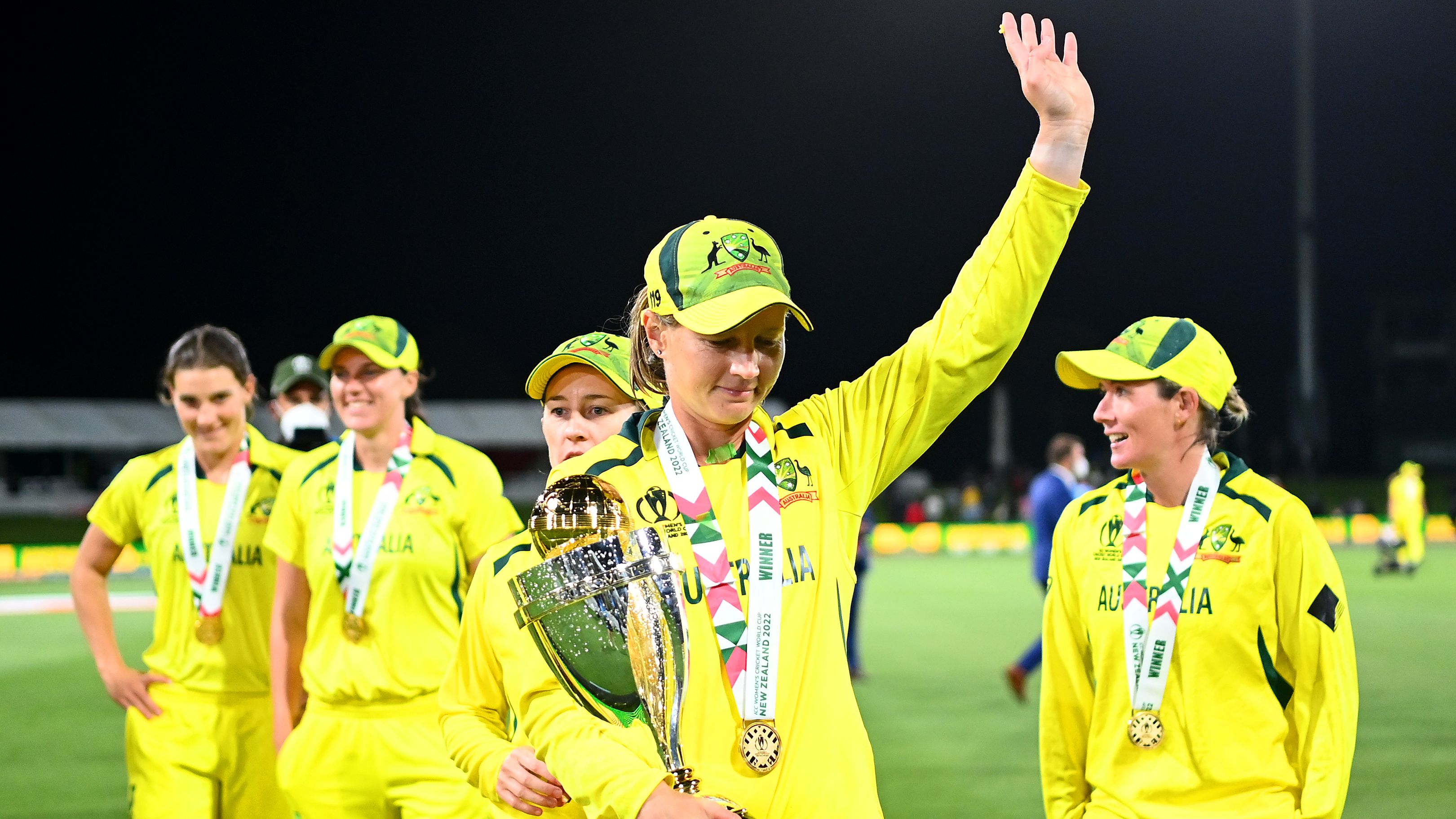 Australia captain Meg Lanning celebrates with the 2022 Women&#x27;s Cricket World Cup trophy.