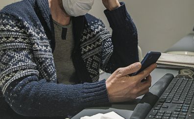 Man working from home on the phone