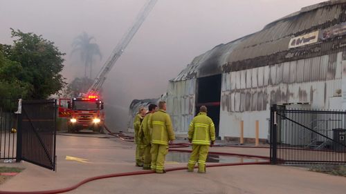 Emergency services were called to Asian United Food Services to find the warehouse well alight around 12.30am. Picture: 9NEWS.