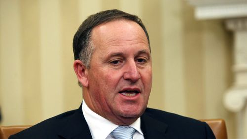 NZ PM apologises for repeatedly pulling woman's hair