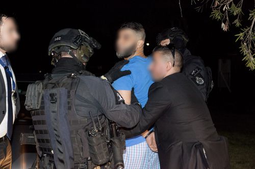 Ahmad 'Rock' Ahmad arrested outside a property in Punchbowl yesterday.